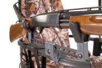 Right-handed or left handed gun holder for tree stand